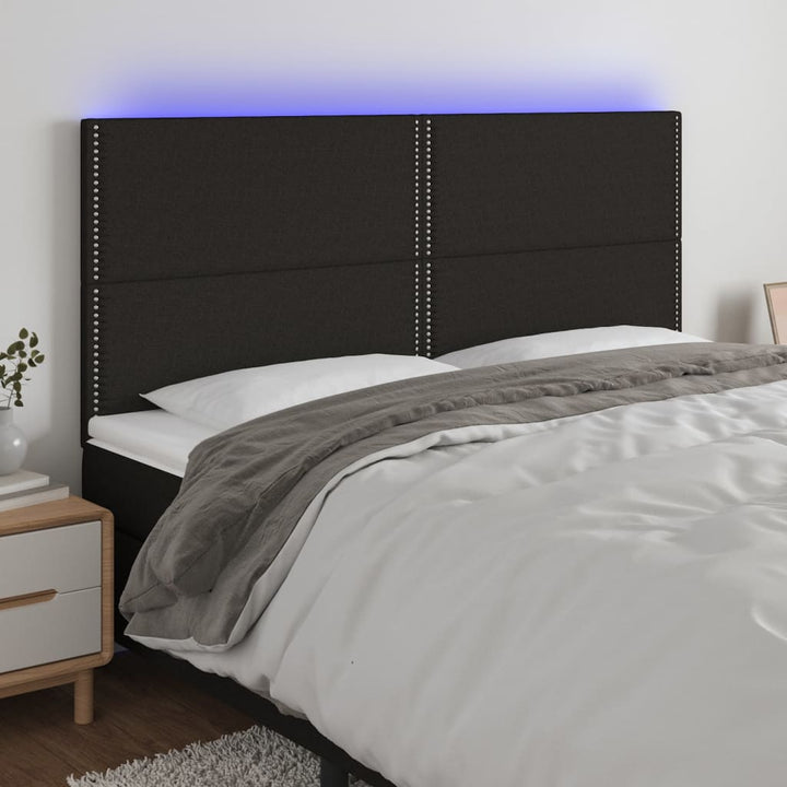 sengegavl med LED-lys 160x5x118/128 cm stof sort