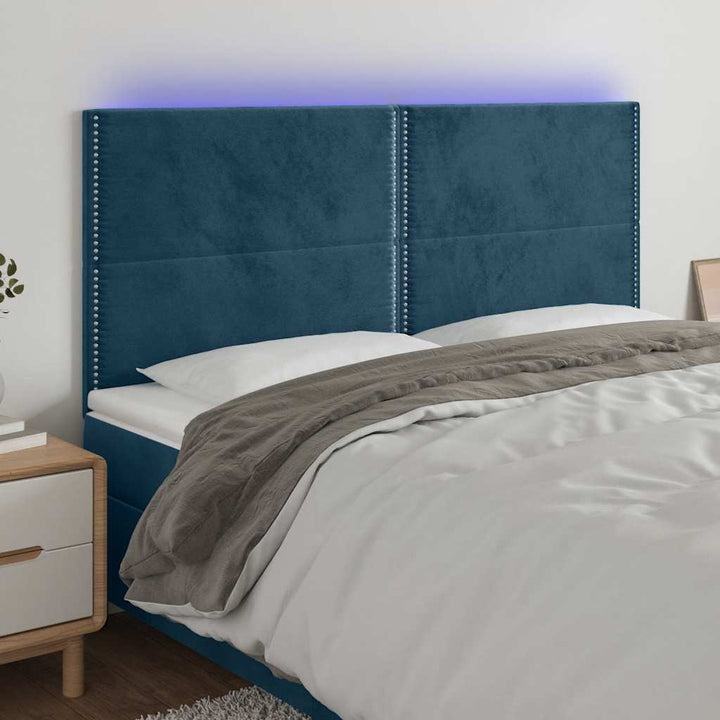 sengegavl med LED-lys 160x5x118/128 cm fløjl mørkeblå