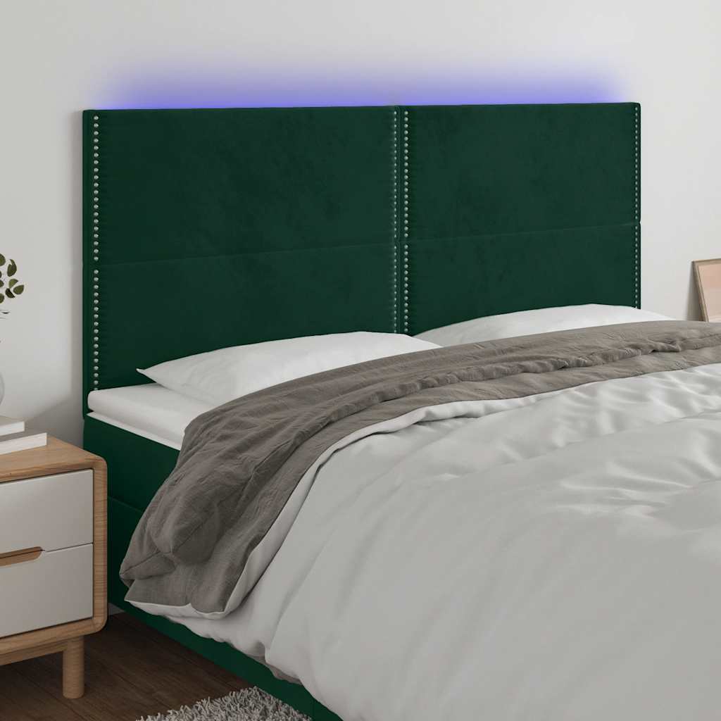 sengegavl med LED-lys 200x5x118/128 cm fløjl mørkegrøn