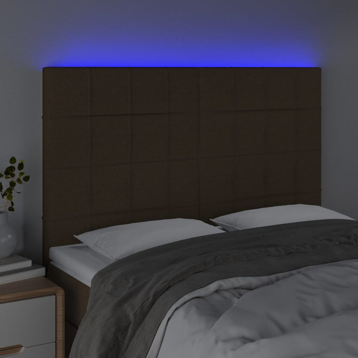 sengegavl med LED-lys 144x5x118/128 cm stof mørkebrun