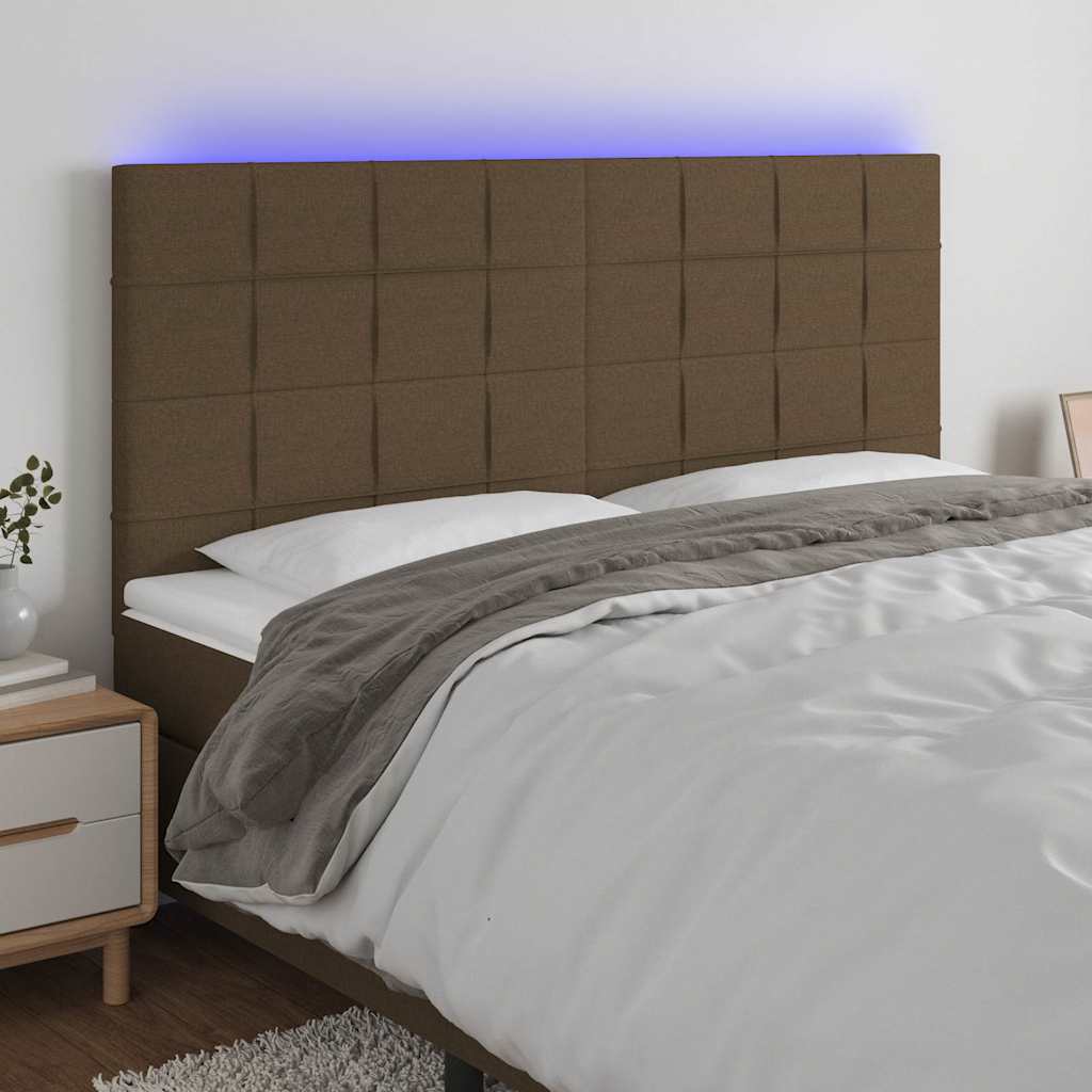 sengegavl med LED-lys 180x5x118/128 cm stof mørkebrun