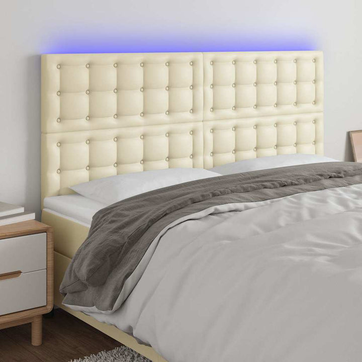 sengegavl med LED-lys 180x5x118/128 cm kunstlæder cremefarvet