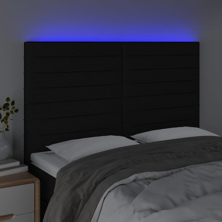 sengegavl med LED-lys 144x5x118/128 cm stof sort