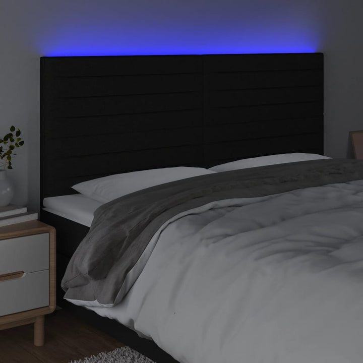 sengegavl med LED-lys 160x5x118/128 cm stof sort