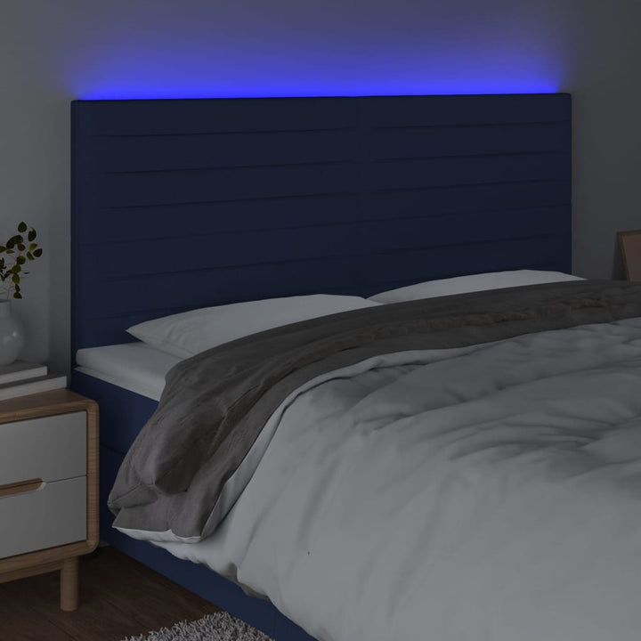 sengegavl med LED-lys 160x5x118/128 cm stof blå