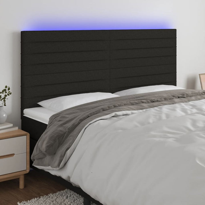 sengegavl med LED-lys 180x5x118/128 cm stof sort