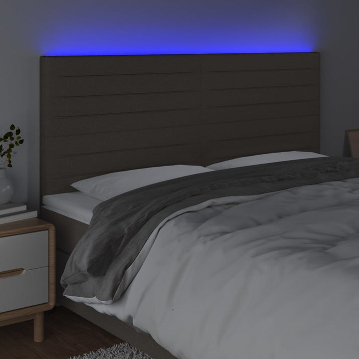 sengegavl med LED-lys 180x5x118/128 cm stof gråbrun