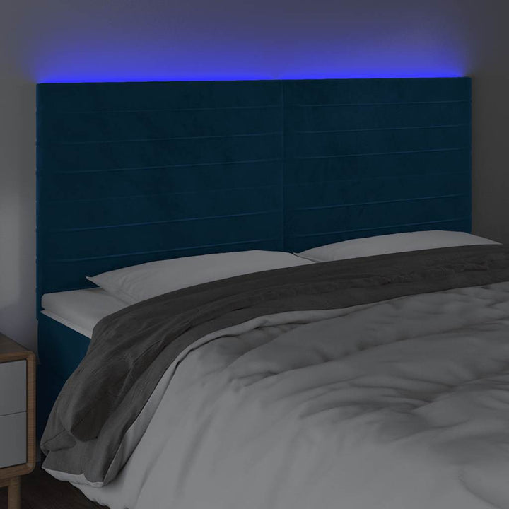 sengegavl med LED-lys 160x5x118/128 cm fløjl mørkeblå