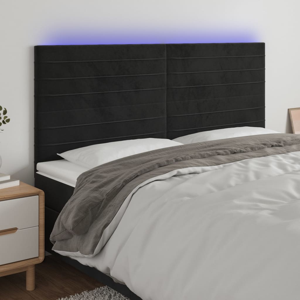sengegavl med LED-lys 200x5x118/128 cm fløjl sort