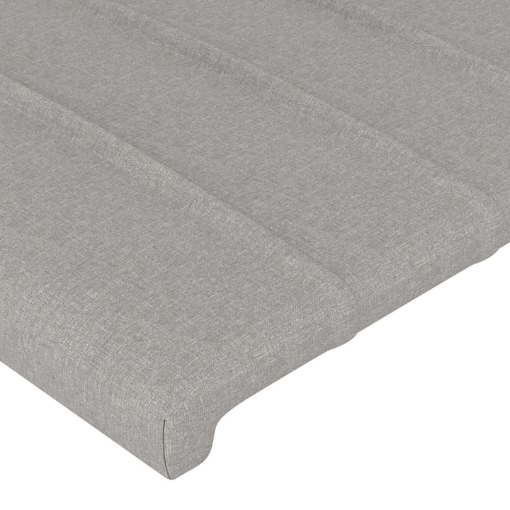 sengegavl med LED-lys 90x5x118/128 cm stof lysegrå