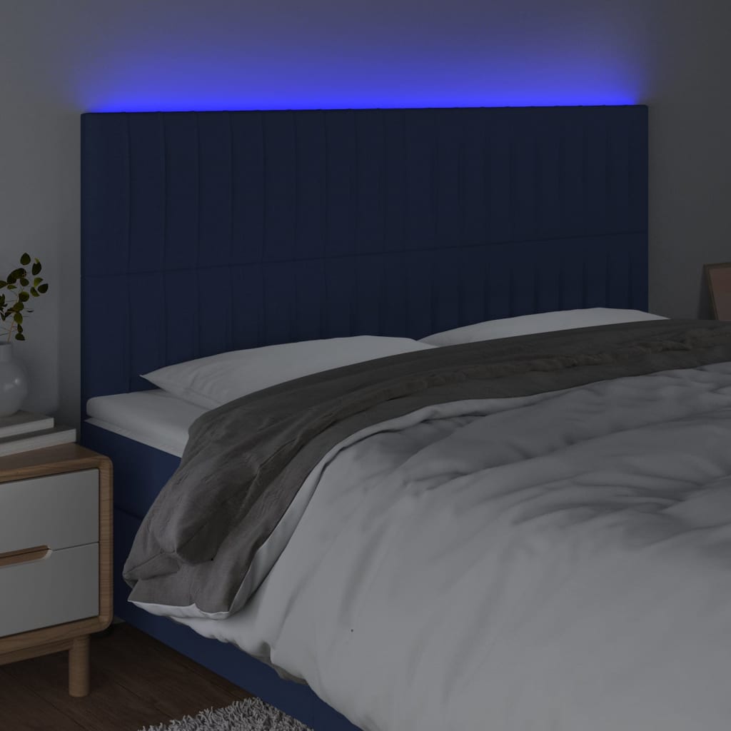 sengegavl med LED-lys 160x5x118/128 cm stof blå