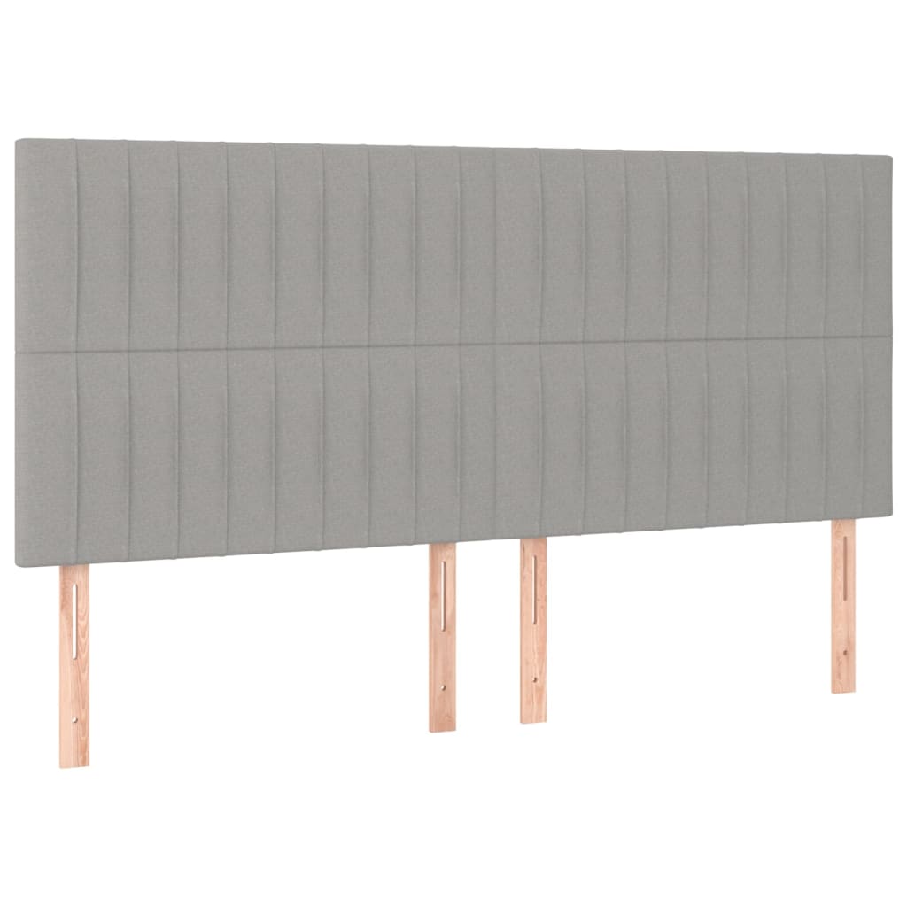 sengegavl med LED-lys 180x5x118/128 cm stof lysegrå