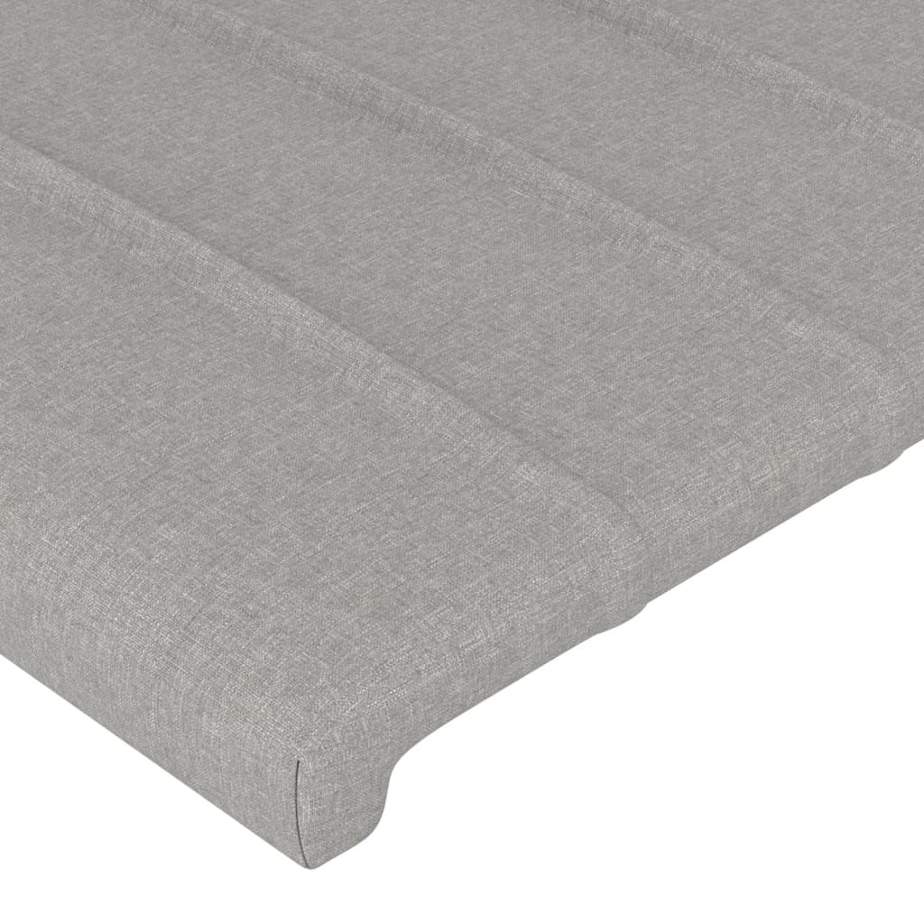 sengegavl med LED-lys 180x5x118/128 cm stof lysegrå