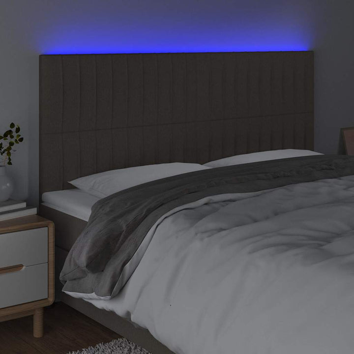 sengegavl med LED-lys 180x5x118/128 cm stof gråbrun