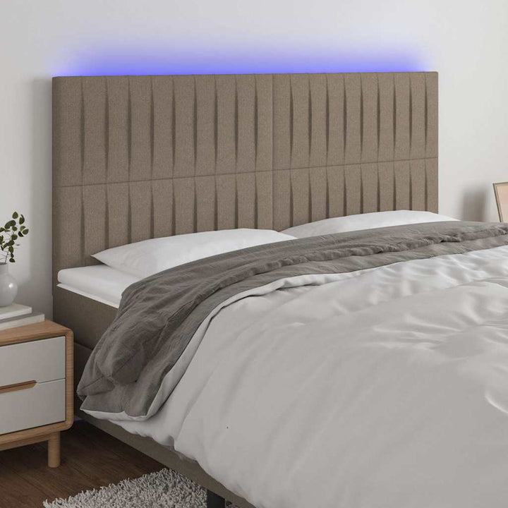 sengegavl med LED-lys 180x5x118/128 cm stof gråbrun