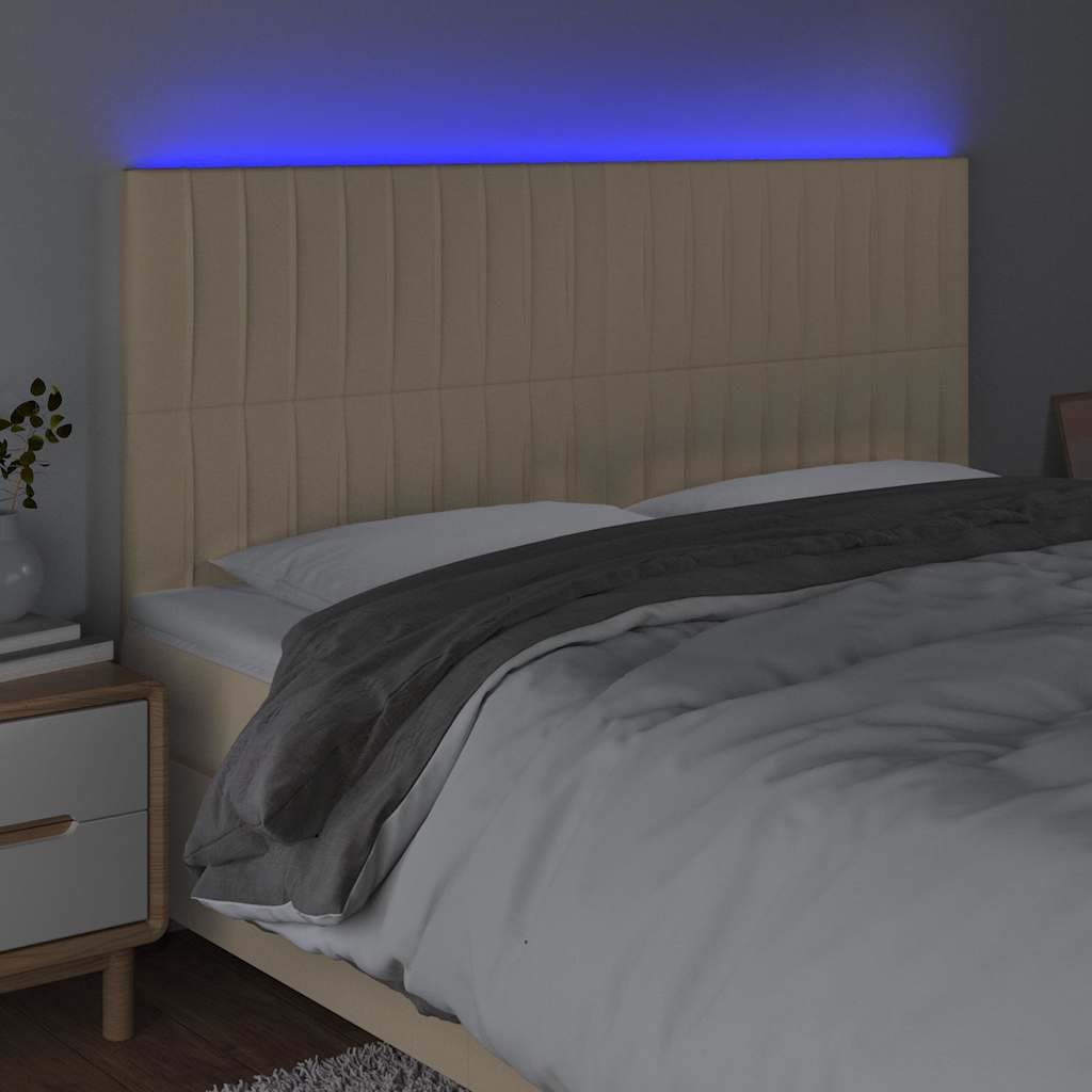 sengegavl med LED-lys 180x5x118/128 cm stof cremefarvet