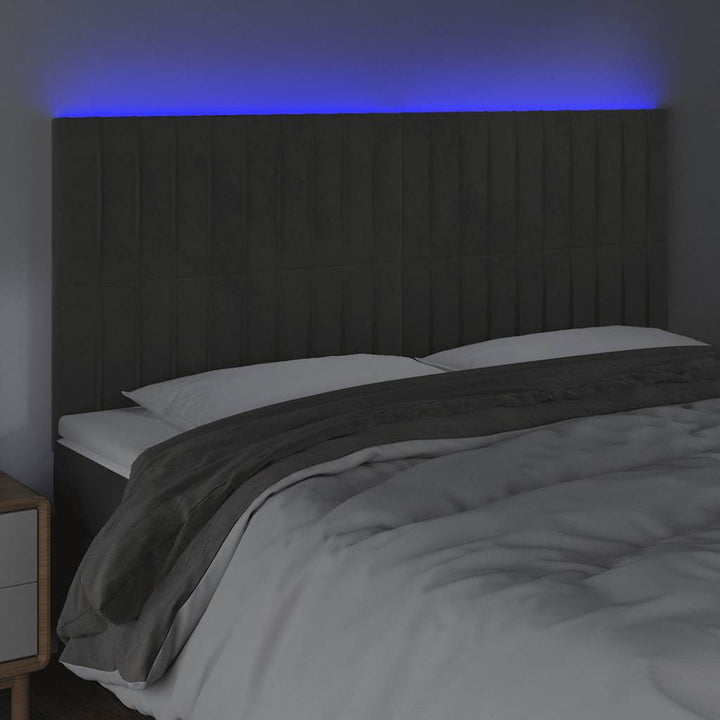 sengegavl med LED-lys 160x5x118/128 cm fløjl mørkegrå