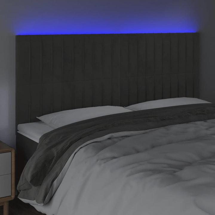 sengegavl med LED-lys 160x5x118/128 cm fløjl mørkegrå