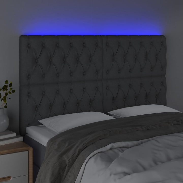 sengegavl med LED-lys 160x7x118/128 cm stof mørkegrå