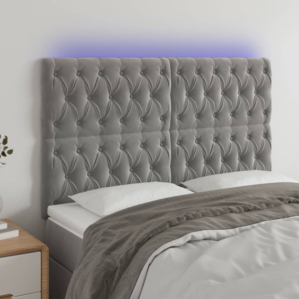 sengegavl med LED-lys 144x7x118/128 cm fløjl lysegrå