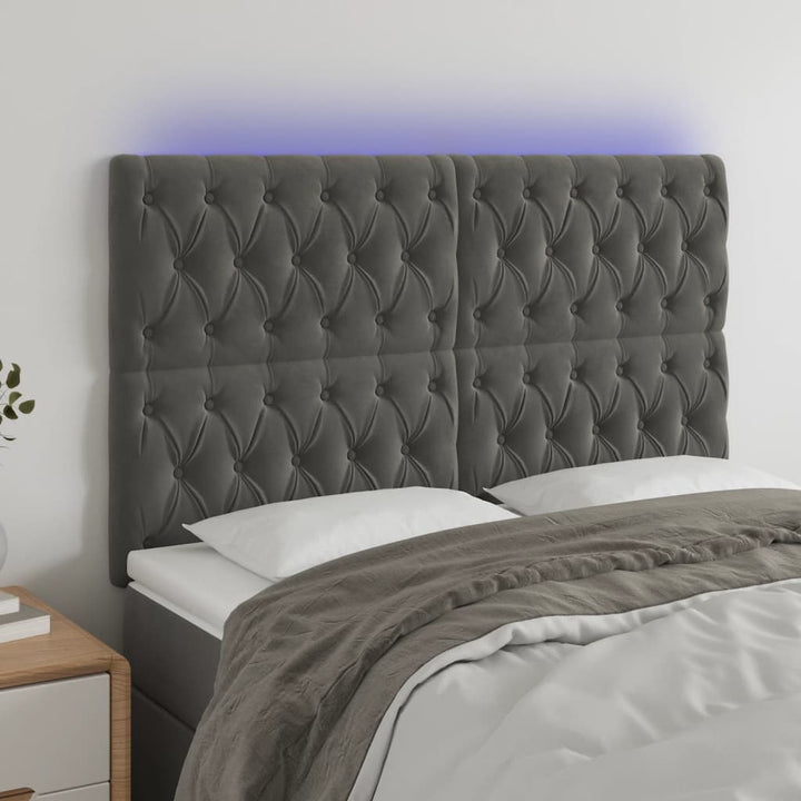 sengegavl med LED-lys 144x7x118/128 cm fløjl mørkegrå