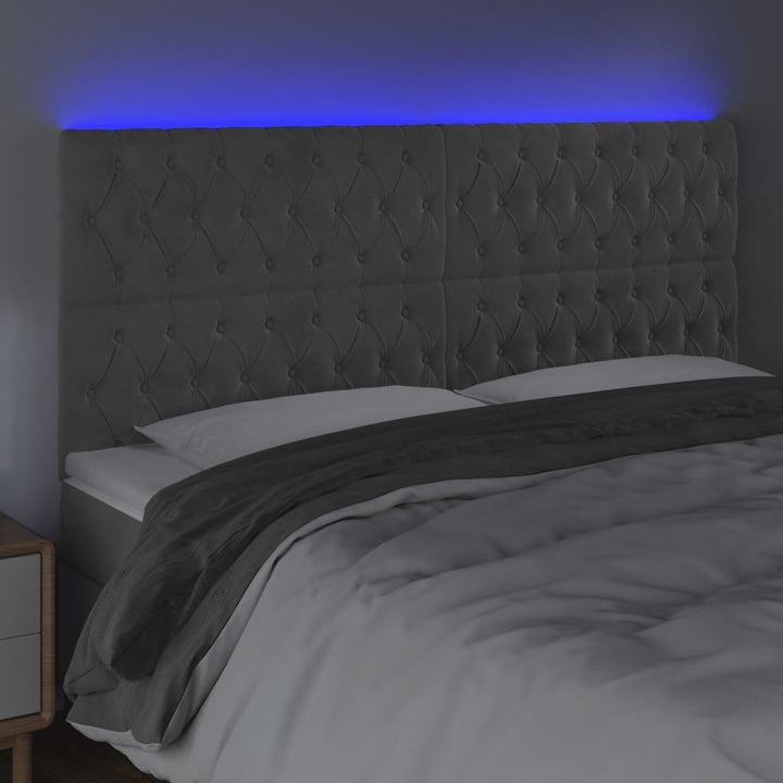 sengegavl med LED-lys 200x7x118/128 cm fløjl lysegrå