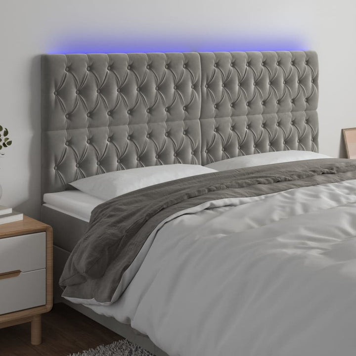 sengegavl med LED-lys 200x7x118/128 cm fløjl lysegrå