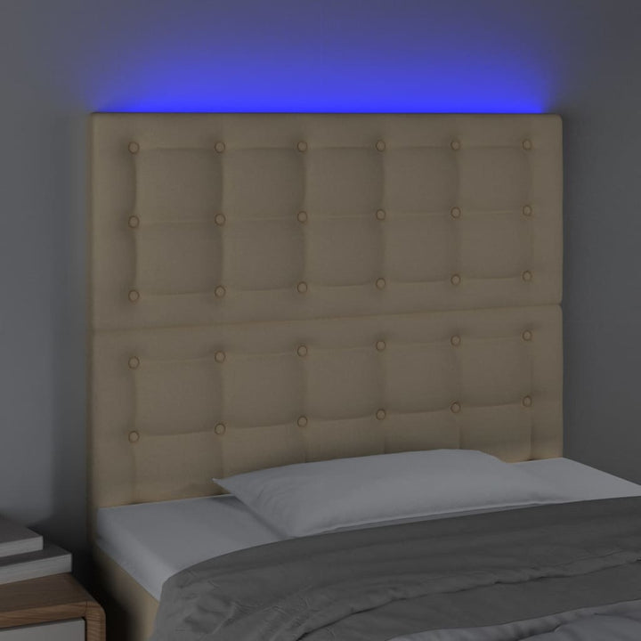 sengegavl med LED-lys 90x5x118/128 cm stof cremefarvet