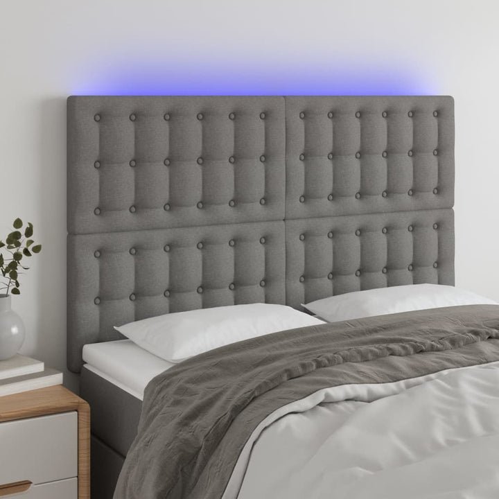 sengegavl med LED-lys 144x5x118/128 cm stof mørkegrå