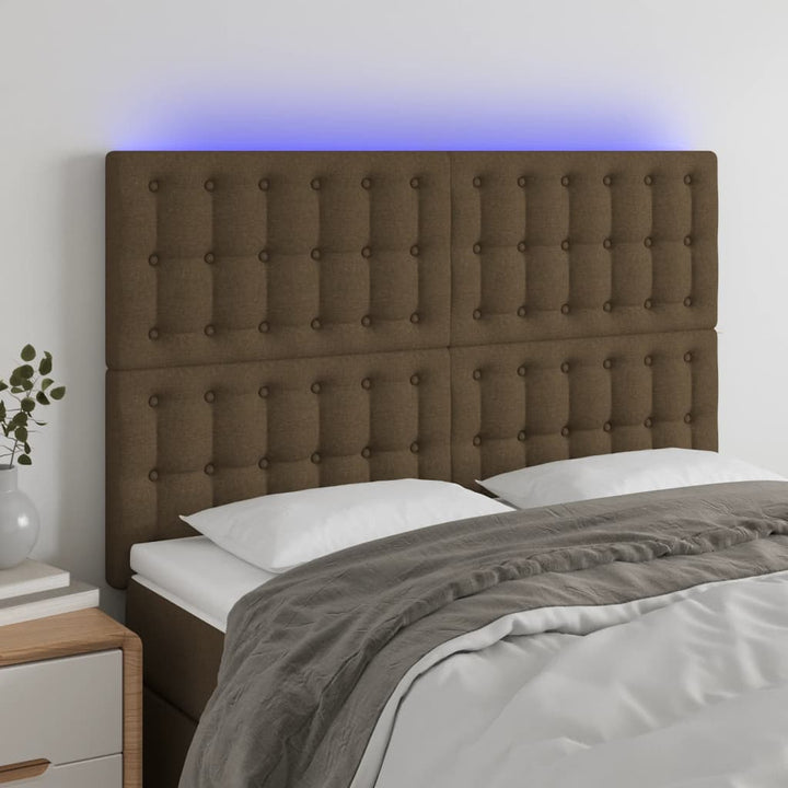 sengegavl med LED-lys 144x5x118/128 cm stof mørkebrun