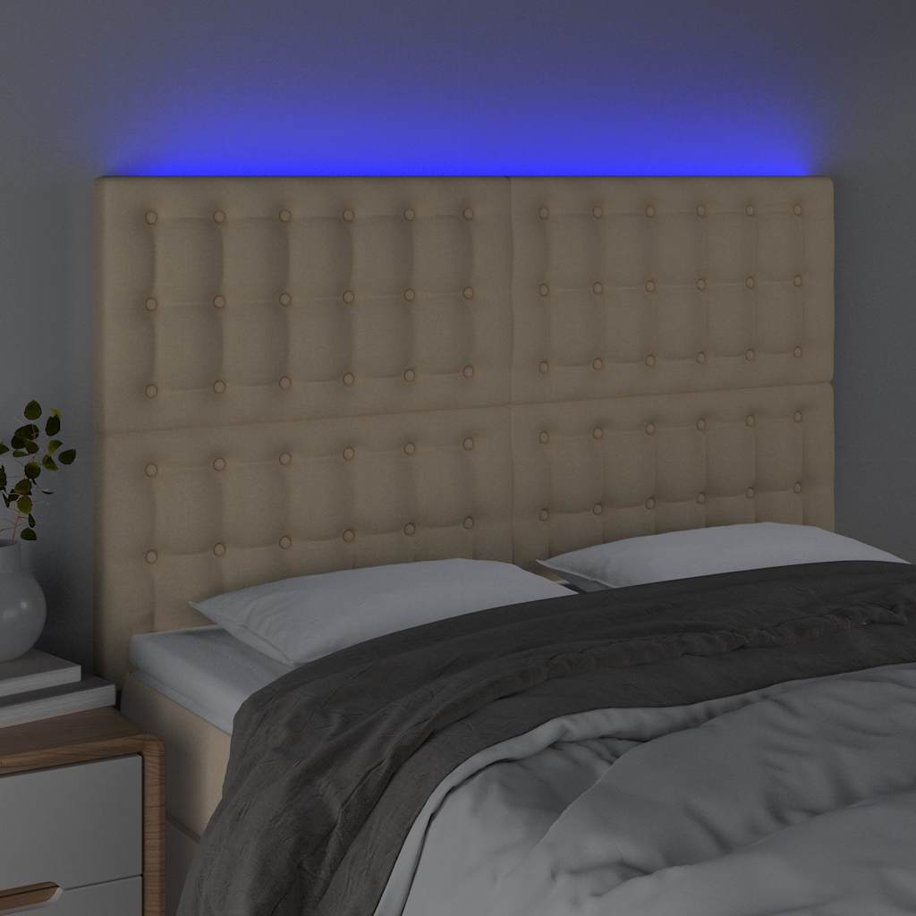 sengegavl med LED-lys 144x5x118/128 cm stof cremefarvet