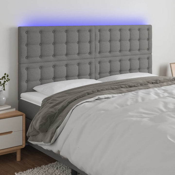 sengegavl med LED-lys 160x5x118/128 cm stof mørkegrå