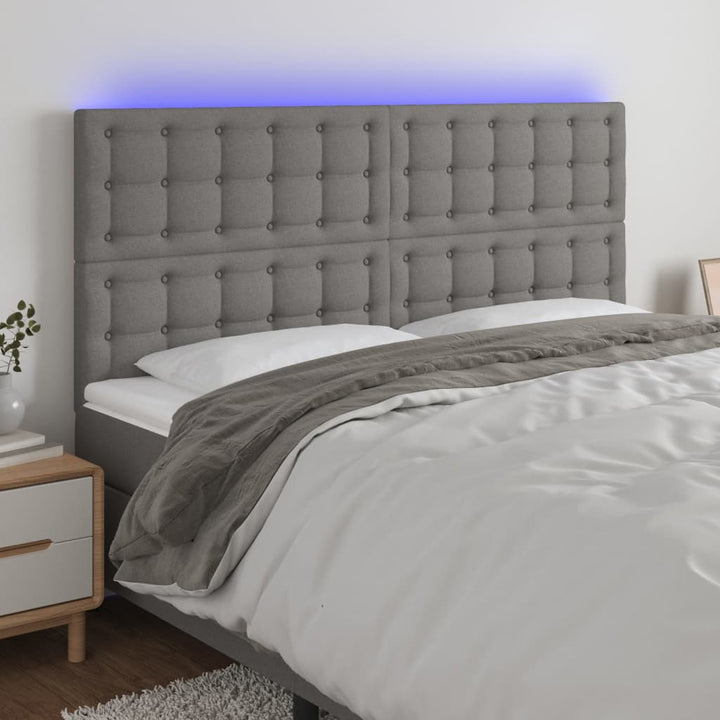 sengegavl med LED-lys 200x5x118/128 cm stof mørkegrå