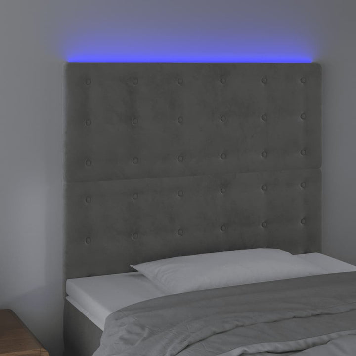 sengegavl med LED-lys 100x5x118/128 cm fløjl lysegrå