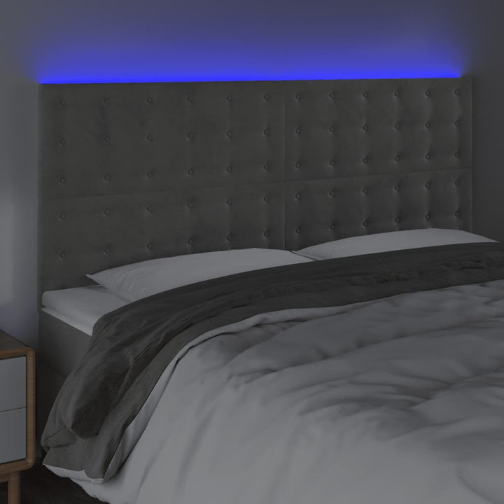 sengegavl med LED-lys 180x5x118/128 cm fløjl lysegrå
