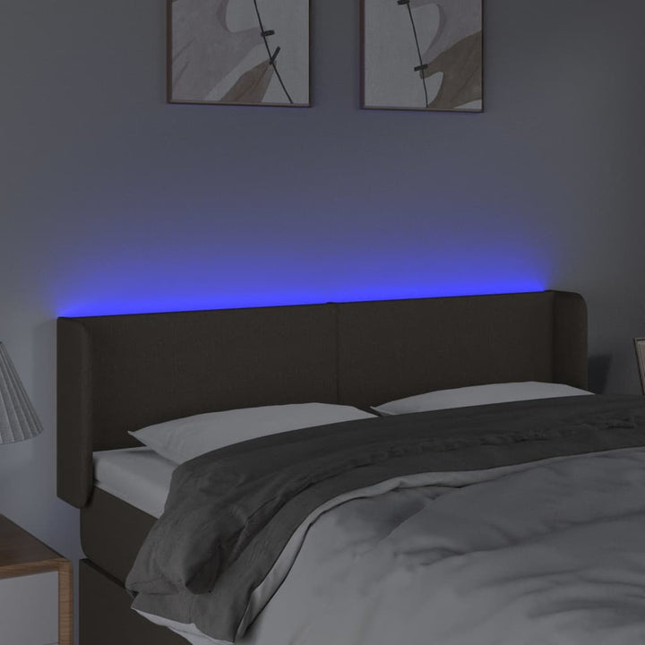 sengegavl med LED-lys 147x16x78/88 cm stof gråbrun