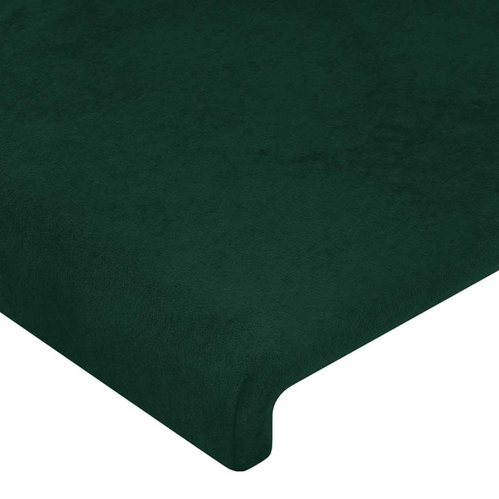 sengegavl med LED-lys 83x16x78/88 cm fløjl Mørkegrøn