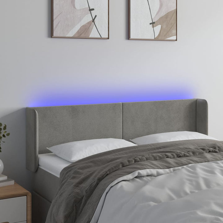 sengegavl med LED-lys 147x16x78/88 cm fløjl lysegrå