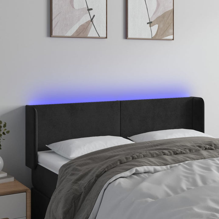 sengegavl med LED-lys 147x16x78/88 cm fløjl sort
