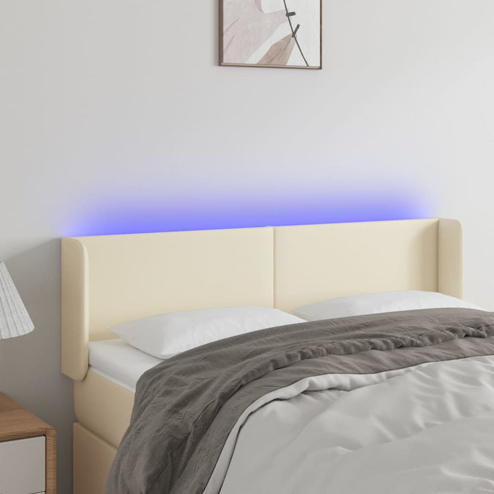 sengegavl med LED-lys 147x16x78/88 cm kunstlæder cremefarvet