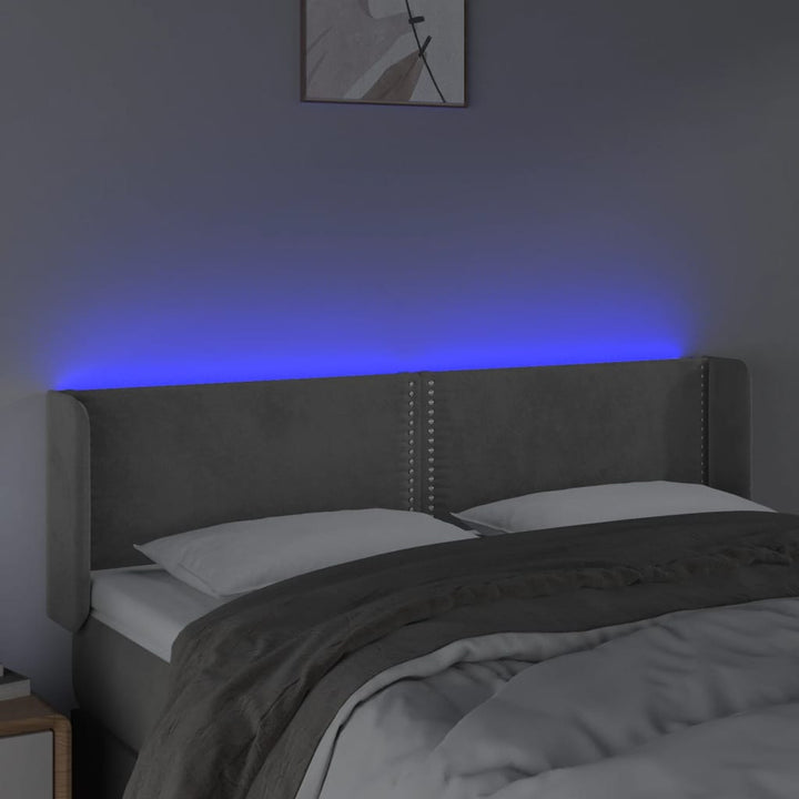 sengegavl med LED-lys 147x16x78/88 cm fløjl lysegrå