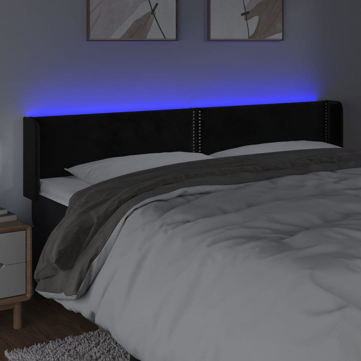 sengegavl med LED-lys 163x16x78/88 cm fløjl sort