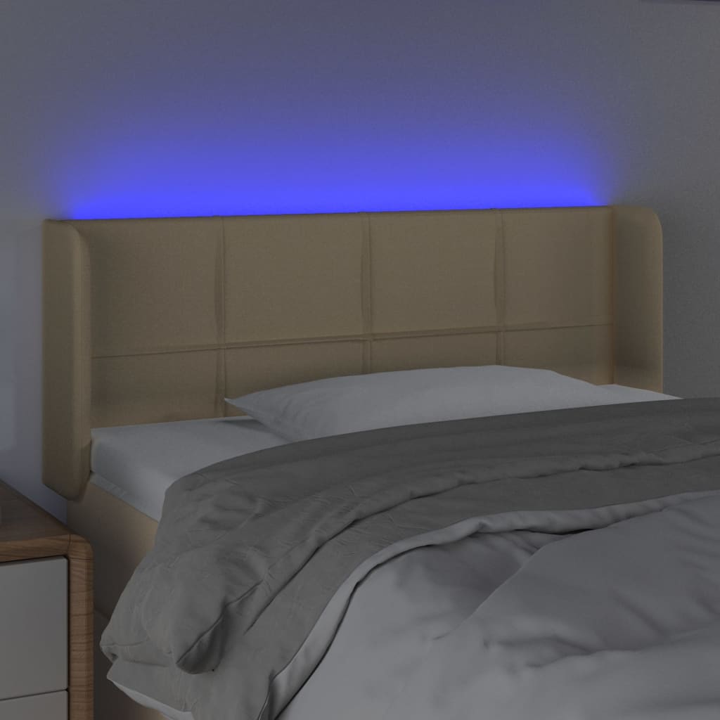 sengegavl med LED-lys 93x16x78/88 cm stof cremefarvet