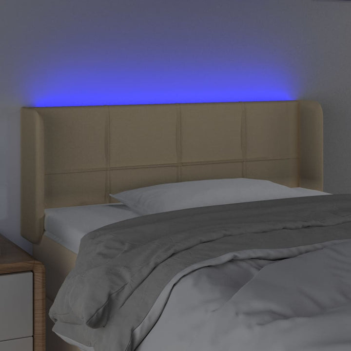 sengegavl med LED-lys 93x16x78/88 cm stof cremefarvet
