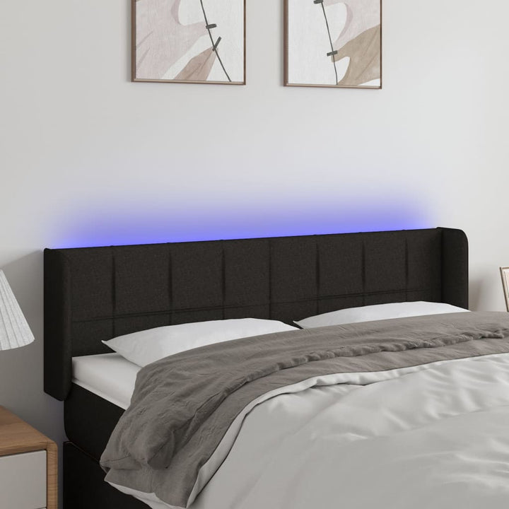 sengegavl med LED-lys 147x16x78/88 cm stof sort