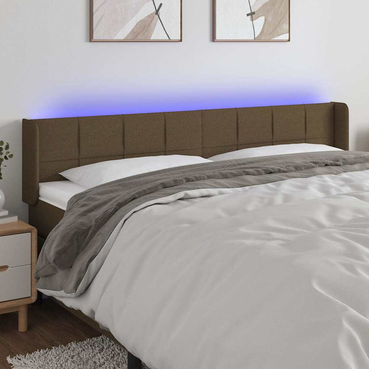 sengegavl med LED-lys 163x16x78/88 cm stof mørkebrun