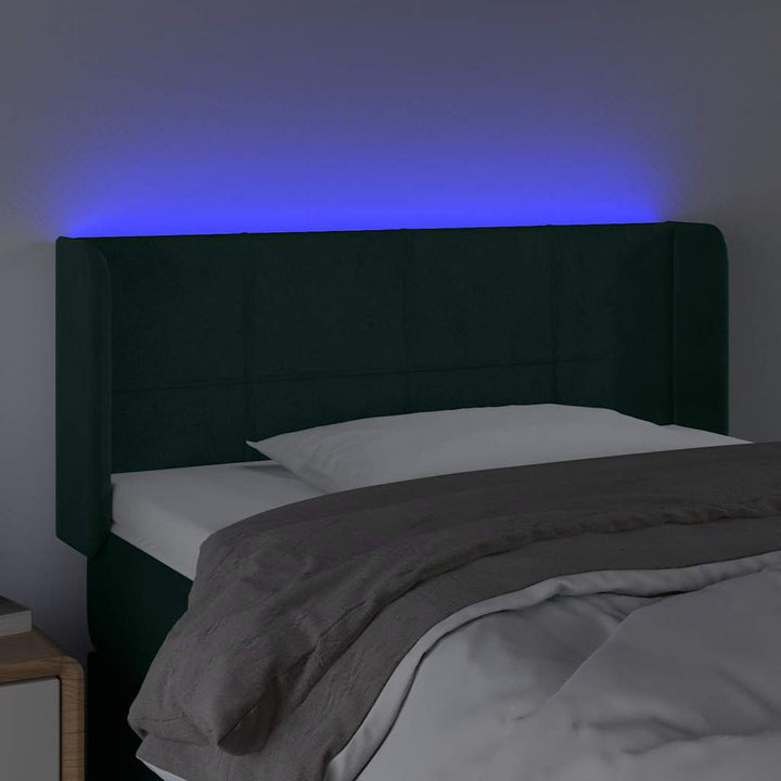 sengegavl med LED-lys 83x16x78/88 cm fløjl Mørkegrøn