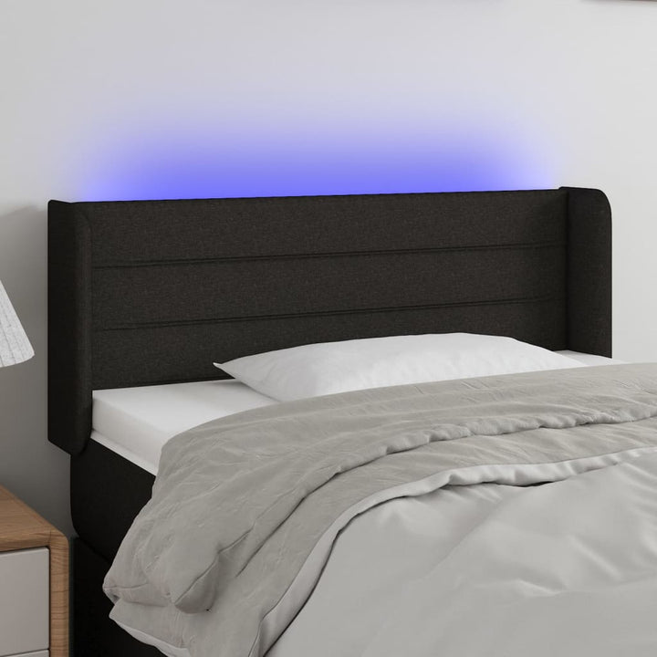 sengegavl med LED-lys 83x16x78/88 cm stof sort