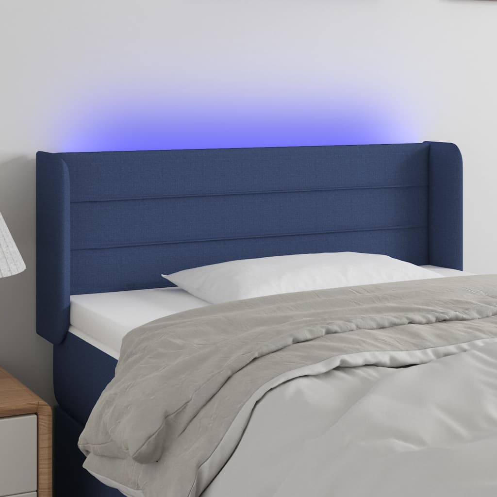 sengegavl med LED-lys 93x16x78/88 cm stof blå