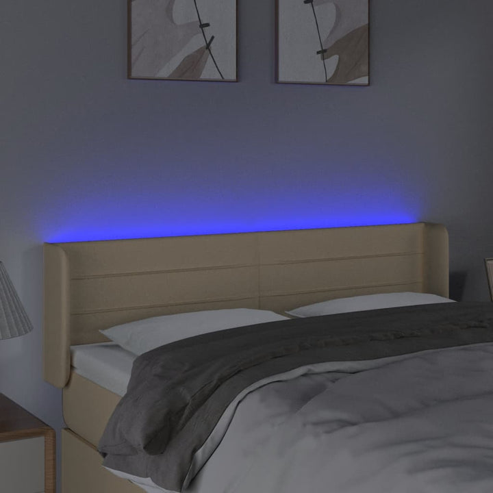 sengegavl med LED-lys 147x16x78/88 cm stof cremefarvet